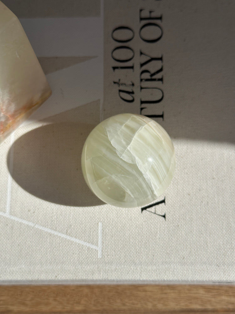 
            
                Load image into Gallery viewer, Green &amp;amp; White Onyx Sphere
            
        